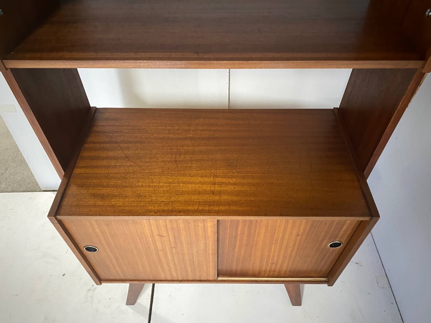 Vintage bookcase with compass feet from the 60s