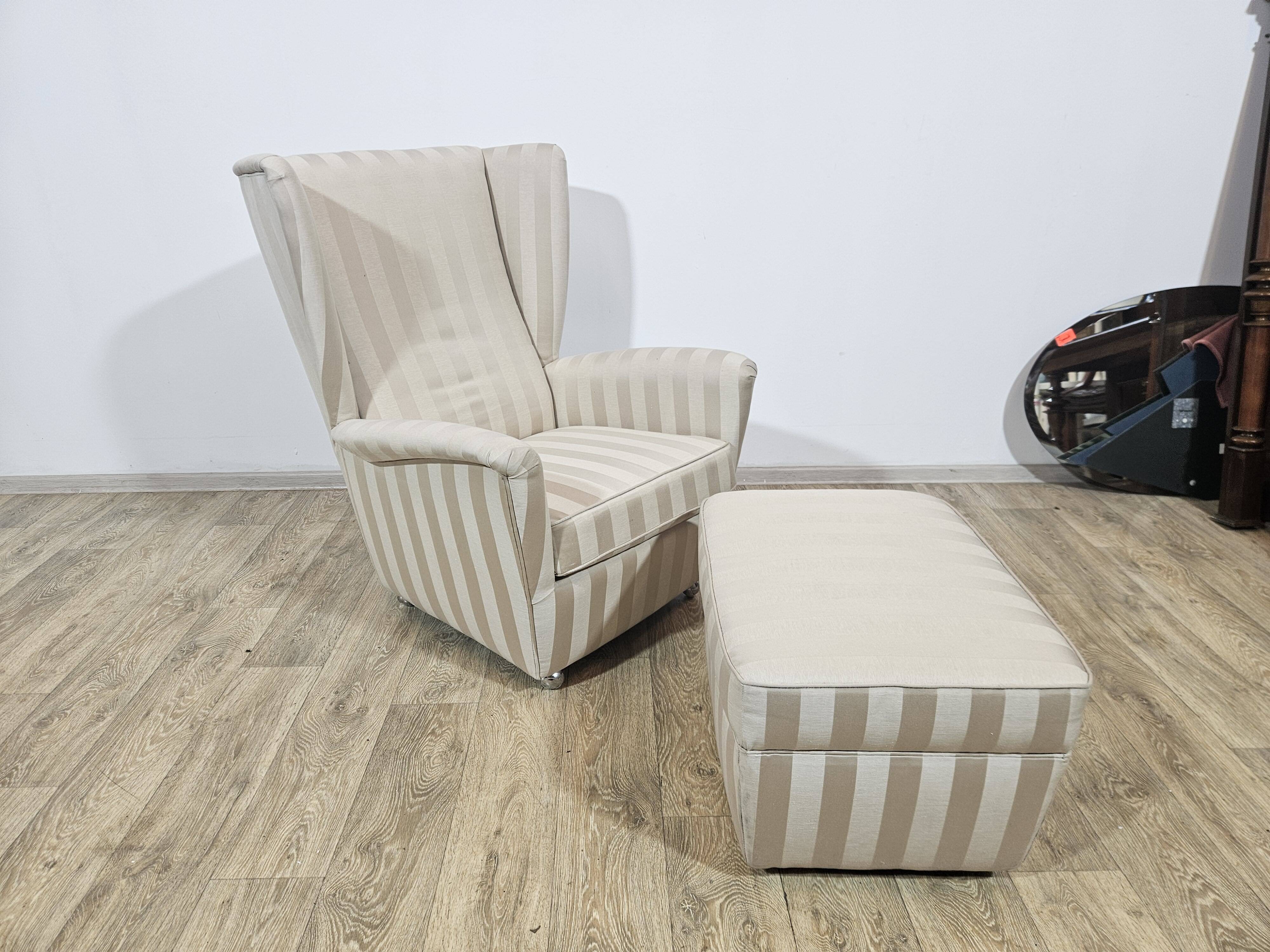 Winged armchair with footstool, 1960s.