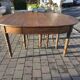 12-foot round oak table with 7 extensions / 20 people