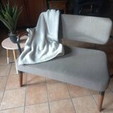 Two-seater sofa in fabric, metal and wooden armrests