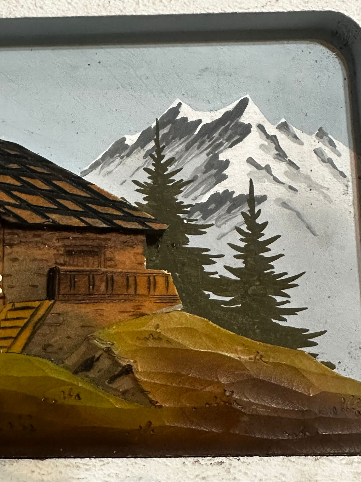 Carved and painted wooden Alpine panel signed 18 / 26 cm