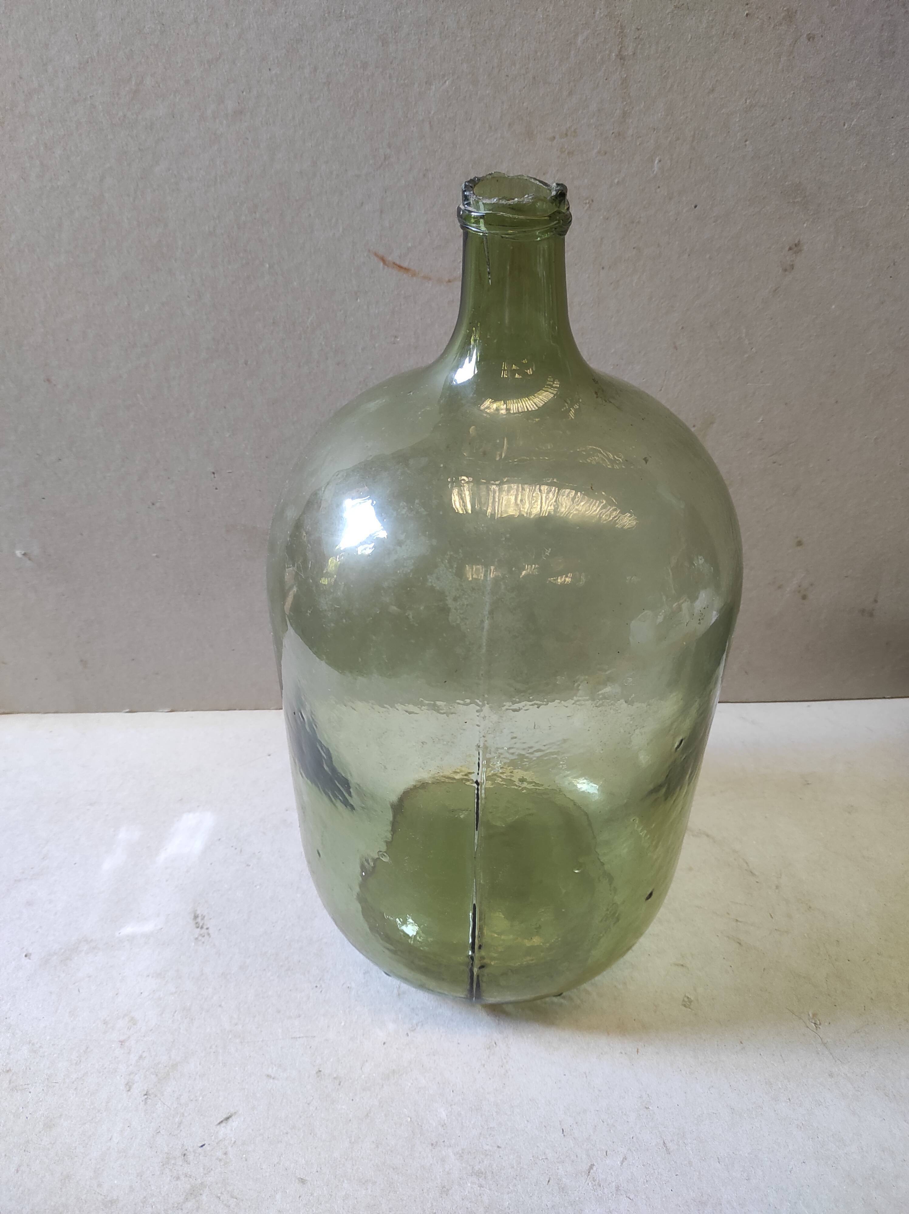 Vintage former lady-jeanne in green glass 10 L broken neck