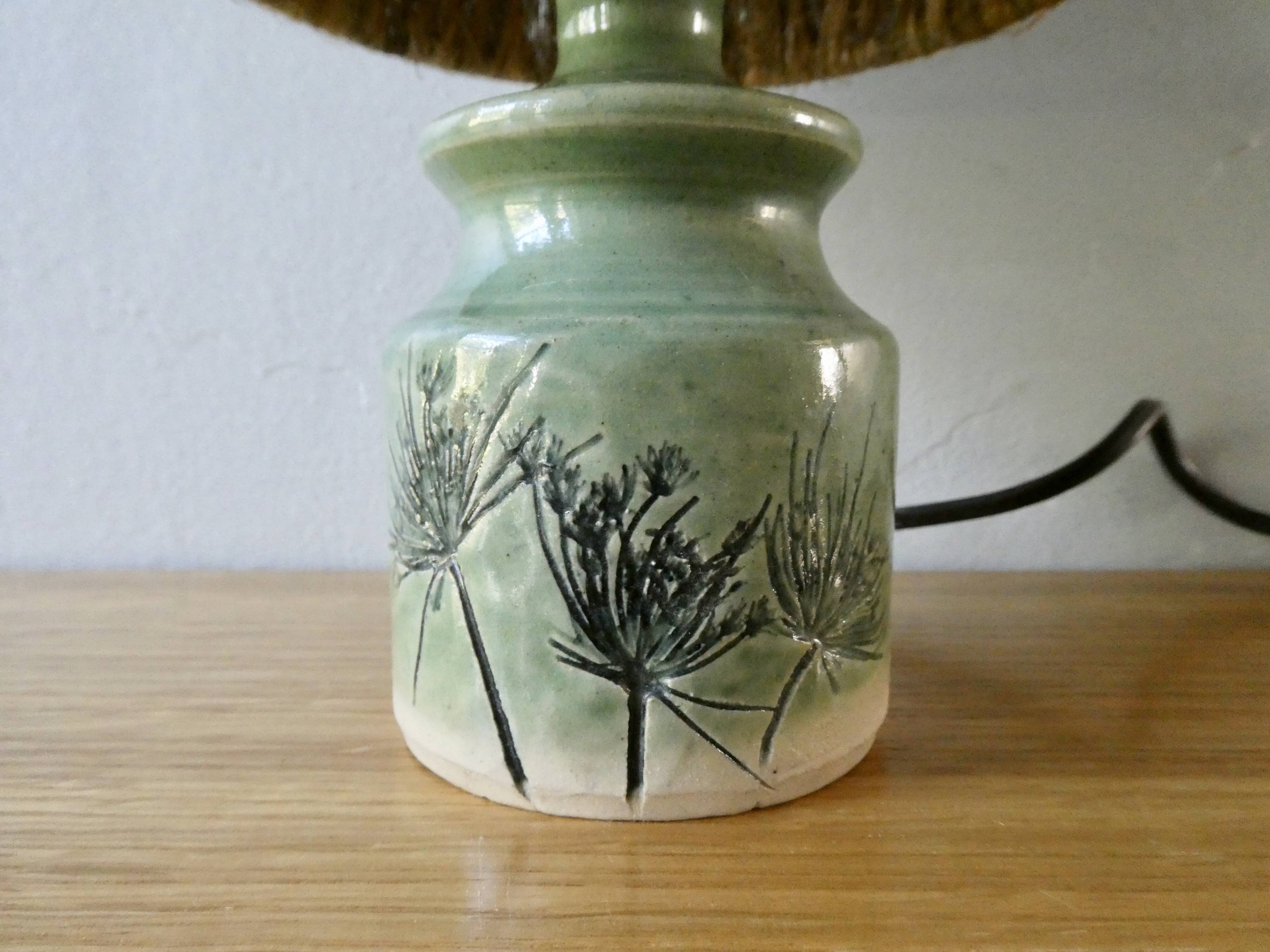 Ceramic lamp, herbarium decoration and fiber blinds