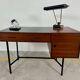 French modernist desk from the 1950s with 2 drawers, 1 cabinet, and 1 container.