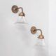 Pair of brass and holophane glass french mid-century wall lights