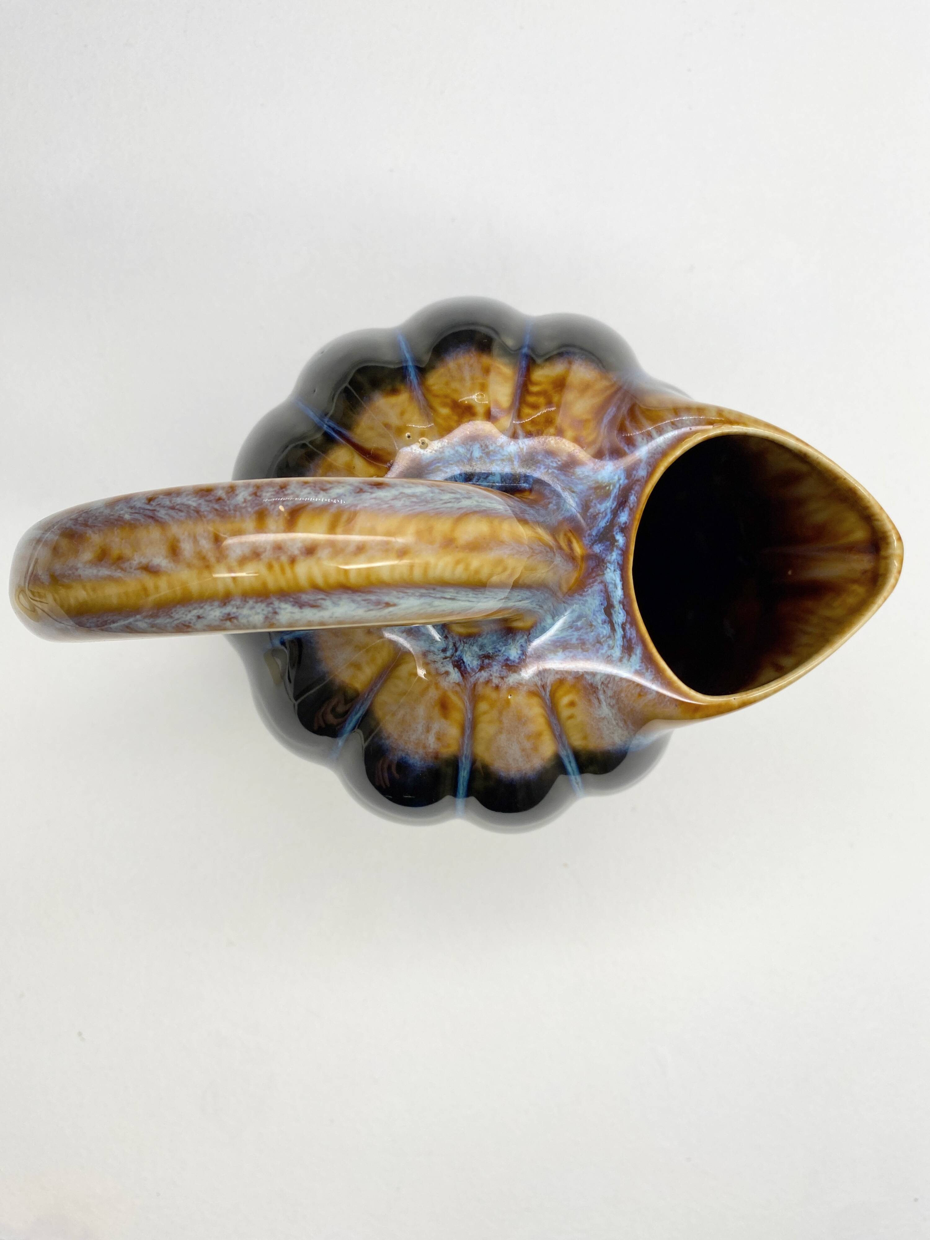 Pitcher Vintage jug in brown and blue ceramic in the shape of a melon