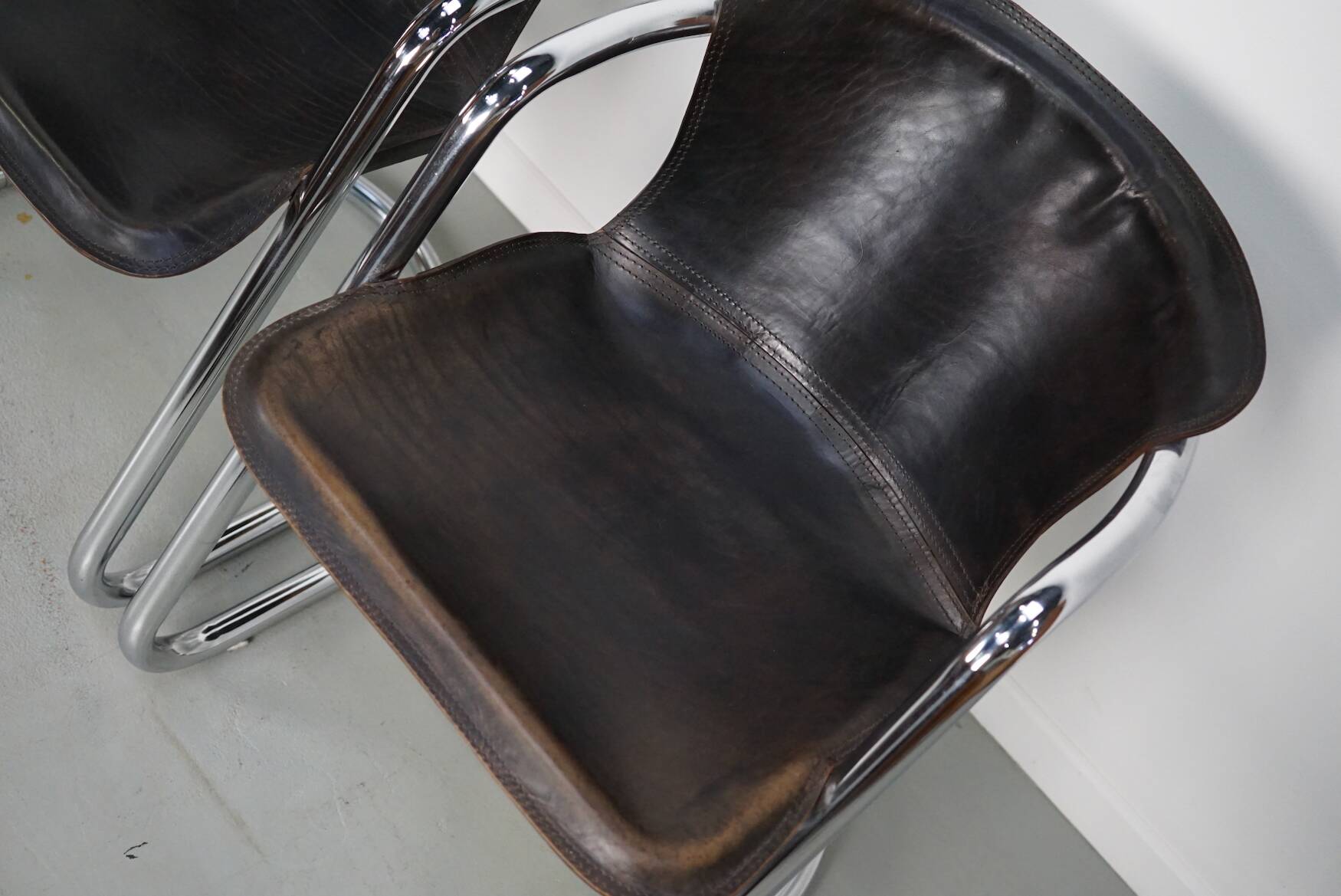 Set of four brown leather dining chairs, Willy Rizzo, 1970