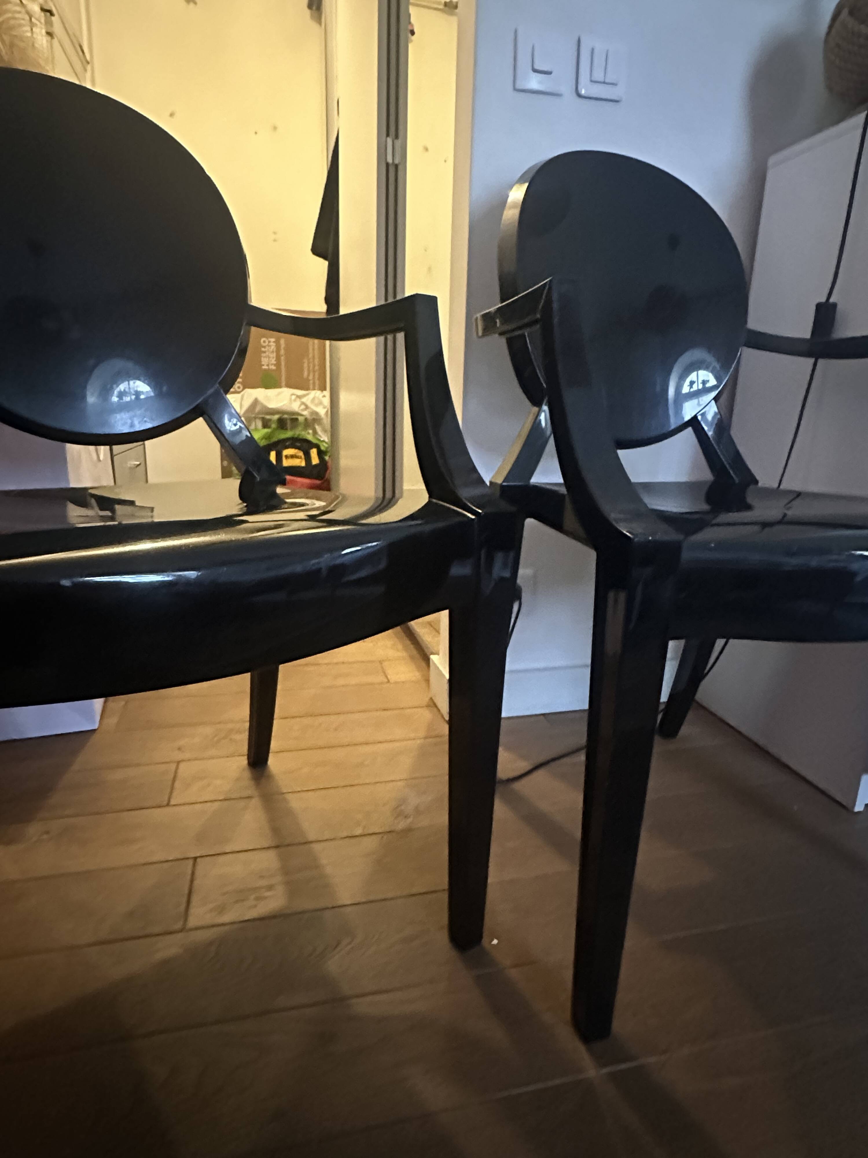 Louis Ghost chairs by Philippe Starck