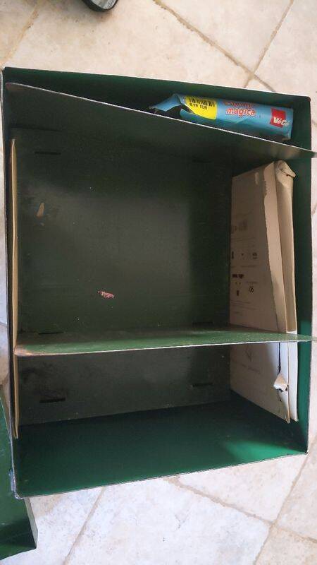 Industrial green metal bedside storage from the 50s
