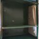 Industrial green metal bedside storage from the 50s