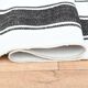 Tapis plat à rayures blanches et noires 152 x 243 cm