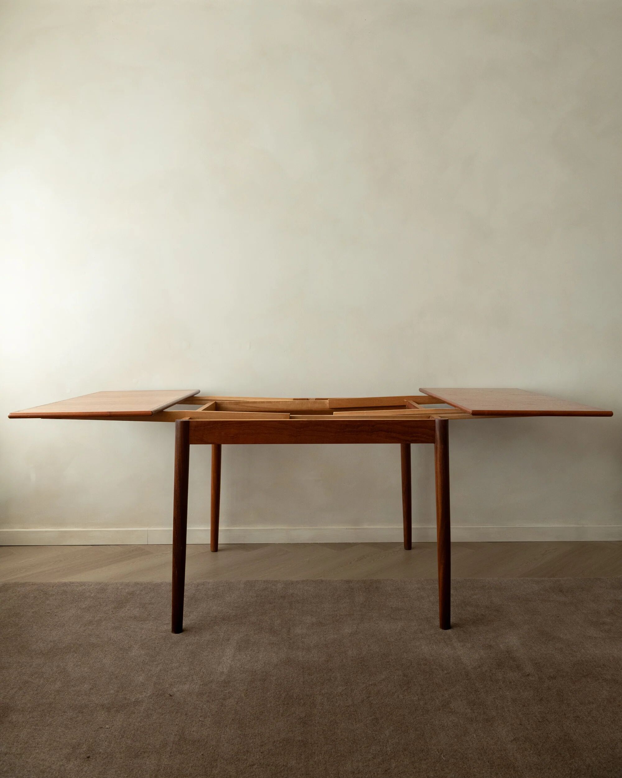 Danish modern teak extendable dining table model 24 by Ansager Møbler 1960s