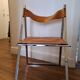2 Chromed metal and leather folding chairs. 70s. Fontoni & Geraci