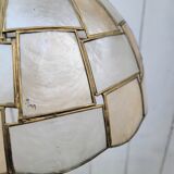 Suspension in mother-of-pearl and brass