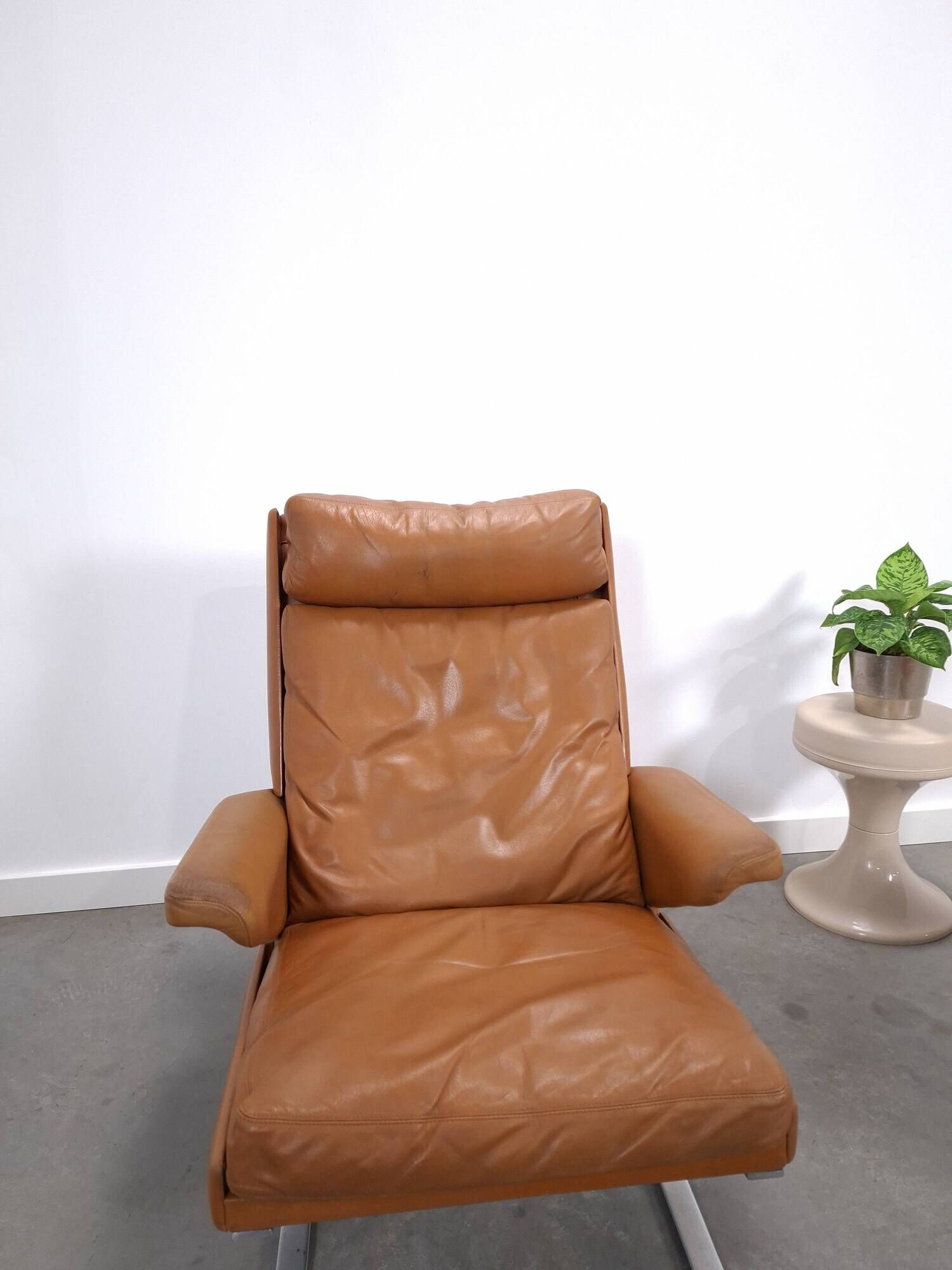 Vintage COR Swing armchair with ottoman, Reinhold Adolf, cognac leather