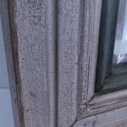 Miroir biseauté bois patiné début xxème