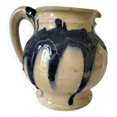 handcrafted ceramic jug with navy blue drip glaze.