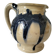 handcrafted ceramic jug with navy blue drip glaze.