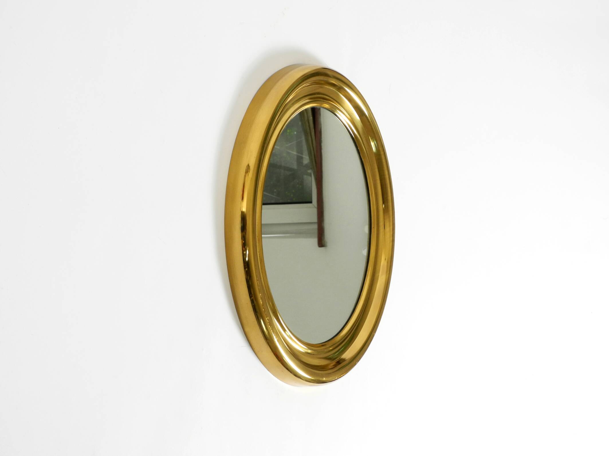 Beautiful, heavy, round Italian brass mirror from the 1960s
