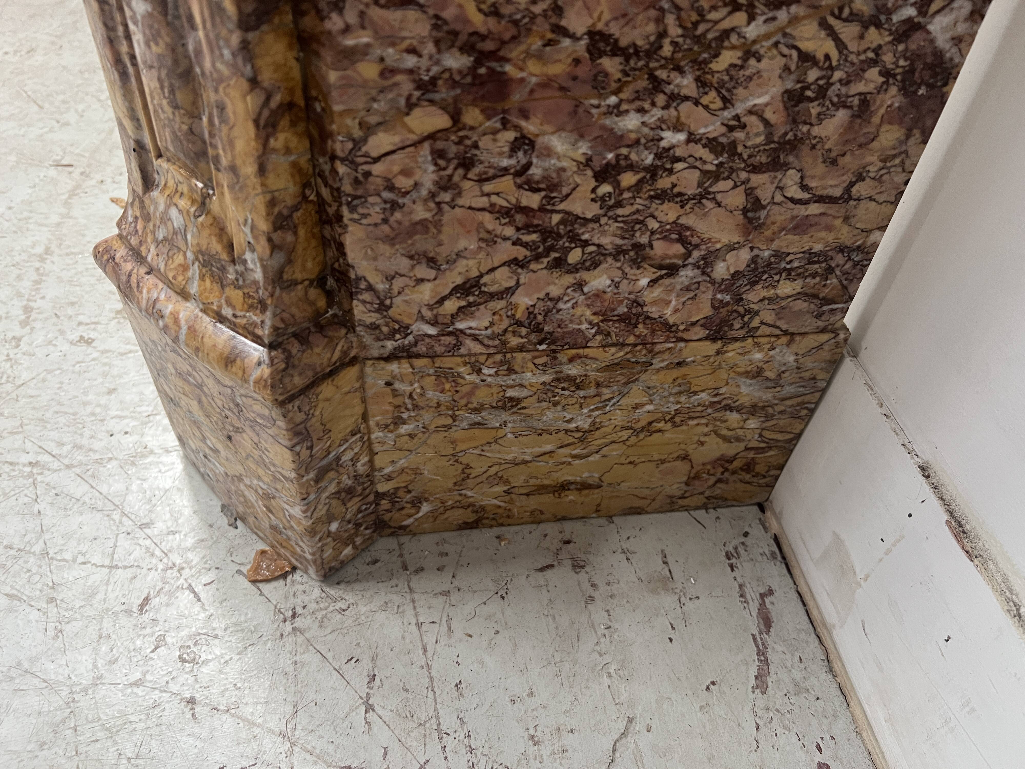 Louis XV style fireplace, Pompadour model, speckled breccia marble, 19th century