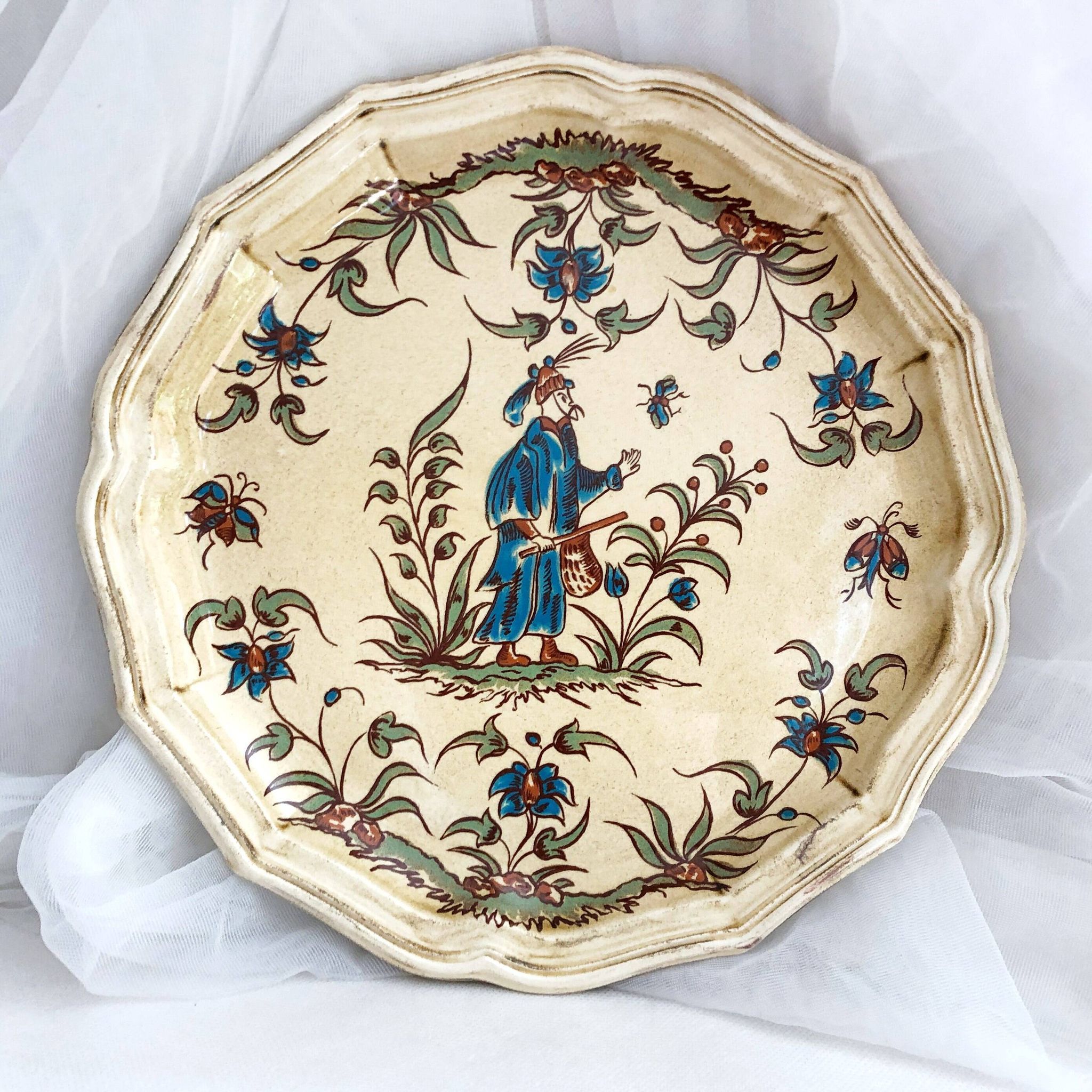 Decorative earthenware plate from Salins France, Moustiers decor, 25.5 cm