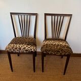 Pair of vintage wood and leopard chairs