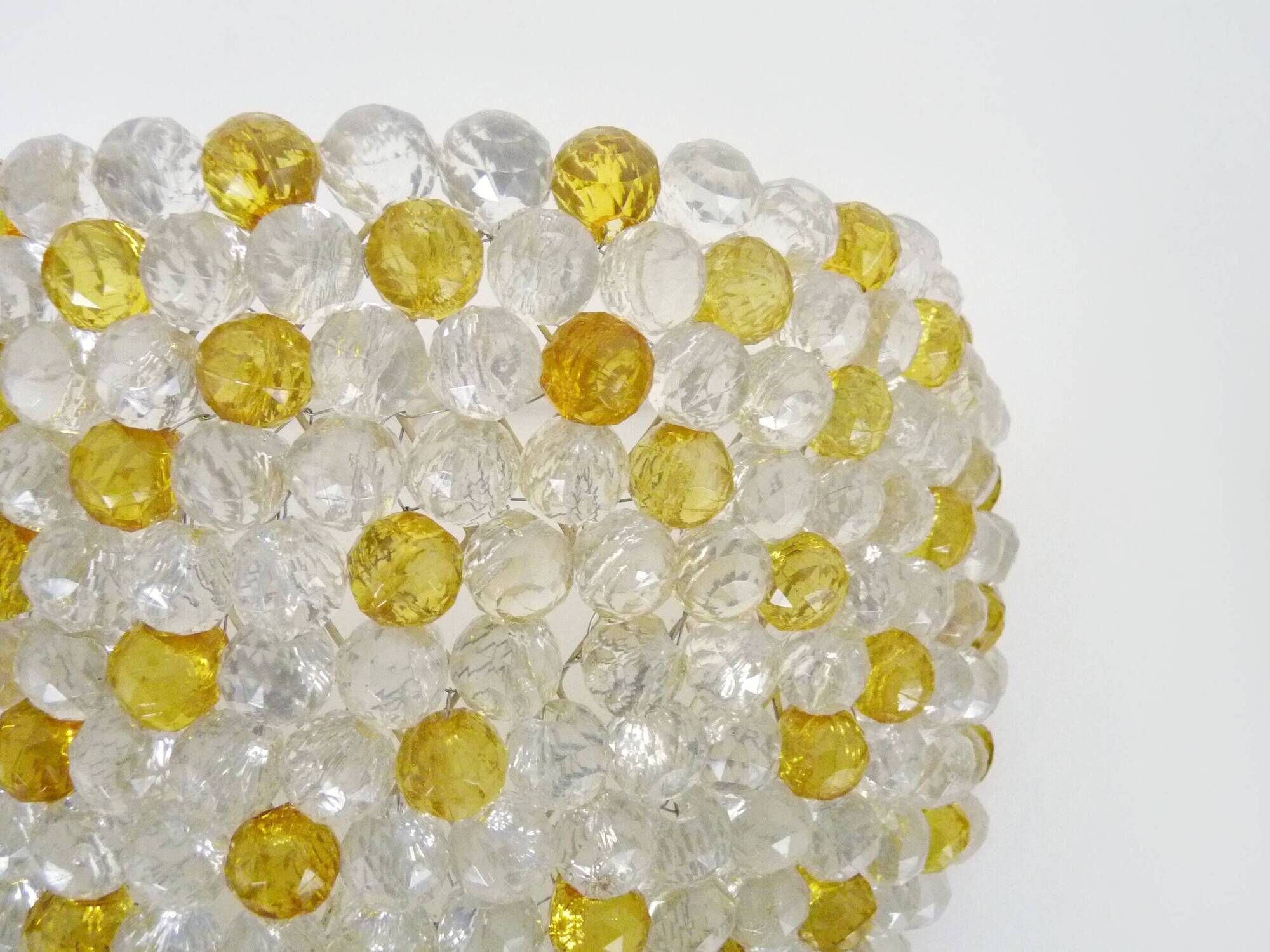 Pair of vintage wall lights with yellow and transparent beads. 70s