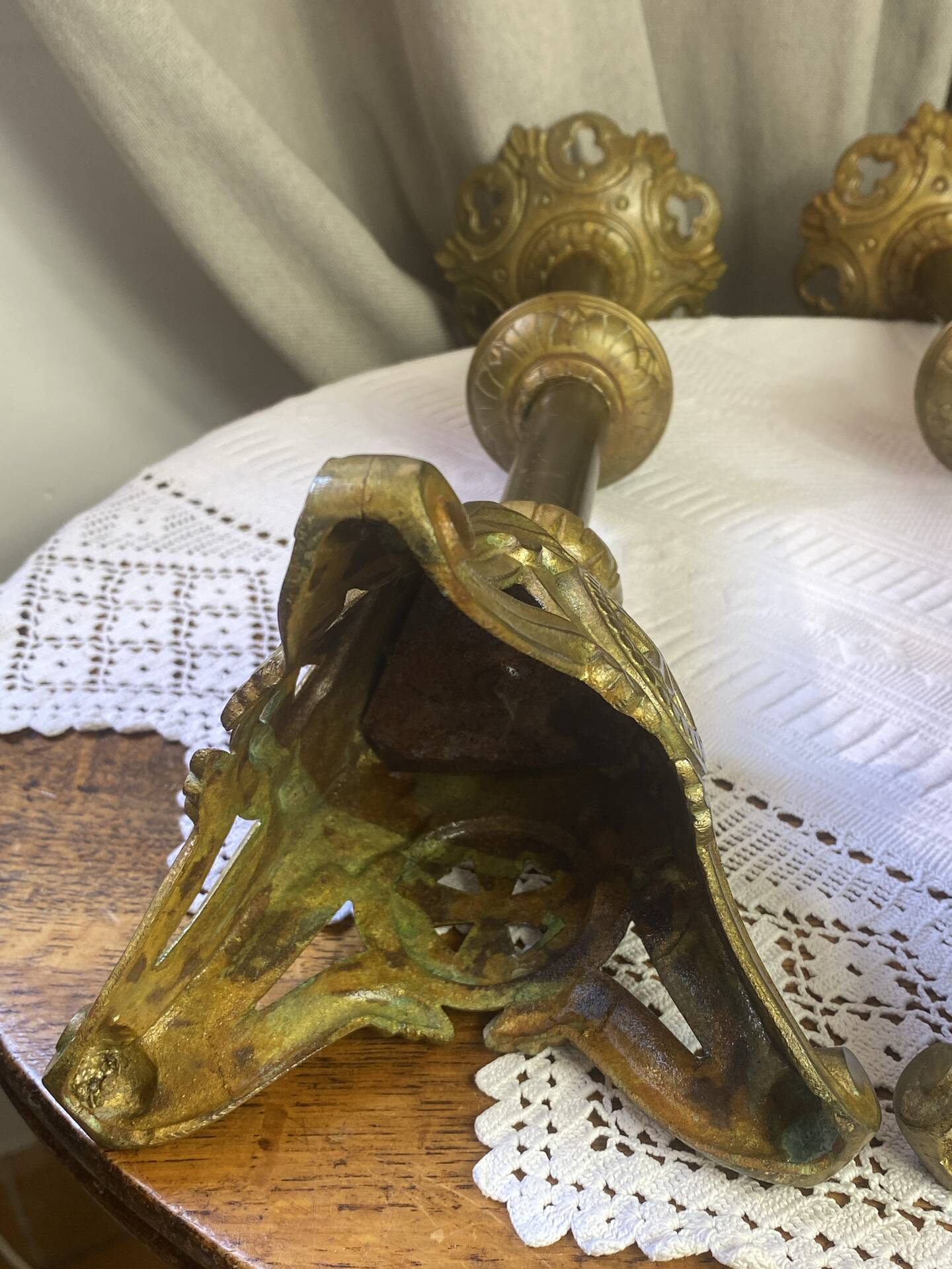 Pair of candlesticks in bronze and brass