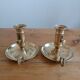 Duo of gilded brass cellar rat candlesticks