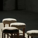 A hexagonal oak stool, seat refurbished in lambswool, Danish design from the 1950s.