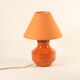 Orange ceramic table lamp with geometric imprints, 1970s.