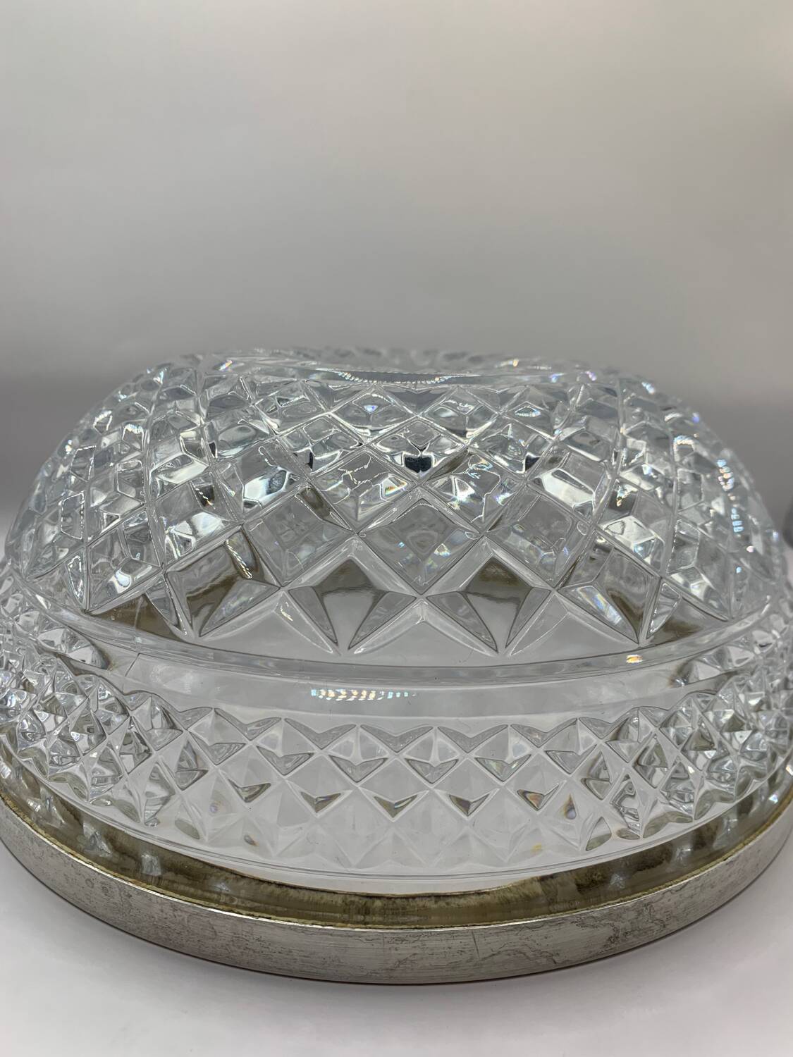 Chiseled glass (crystal?) salad bowl with silver metal edge