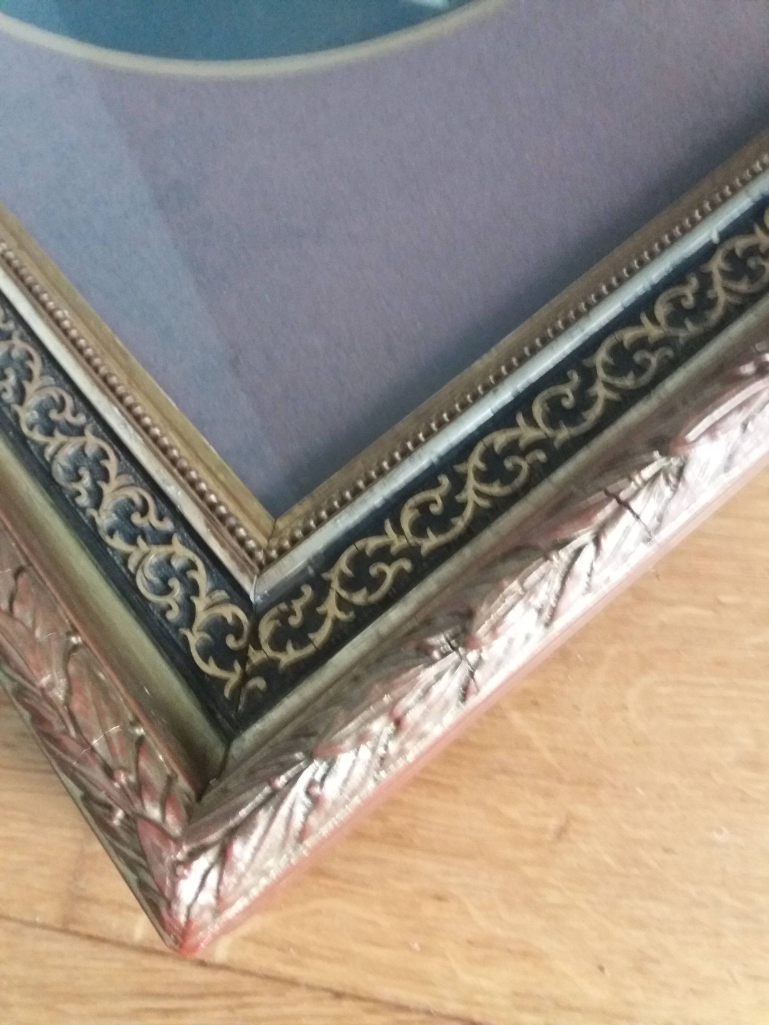 Old photo portrait framed in wood and stucco