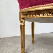 Louis XVI gilt wood and red velvet armchair