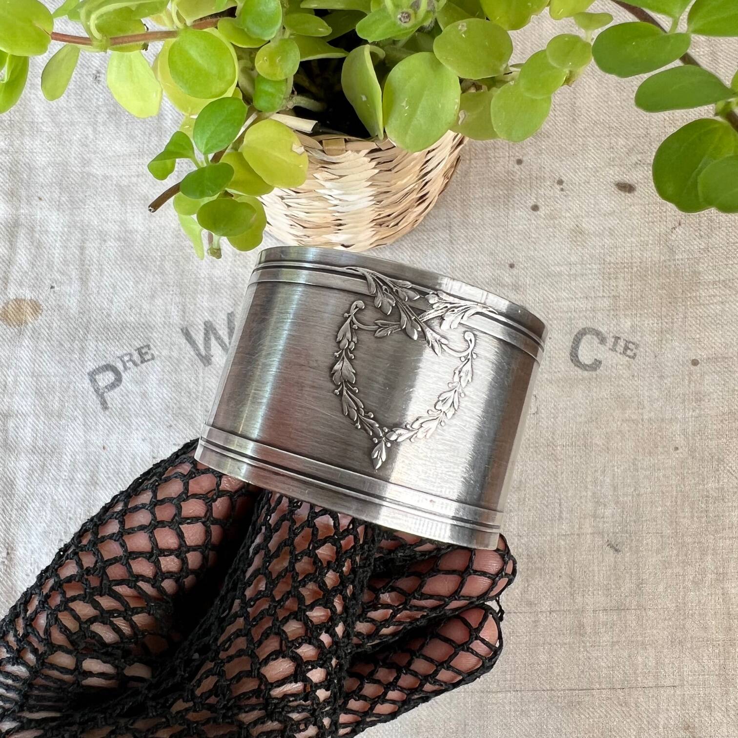 White metal napkin ring