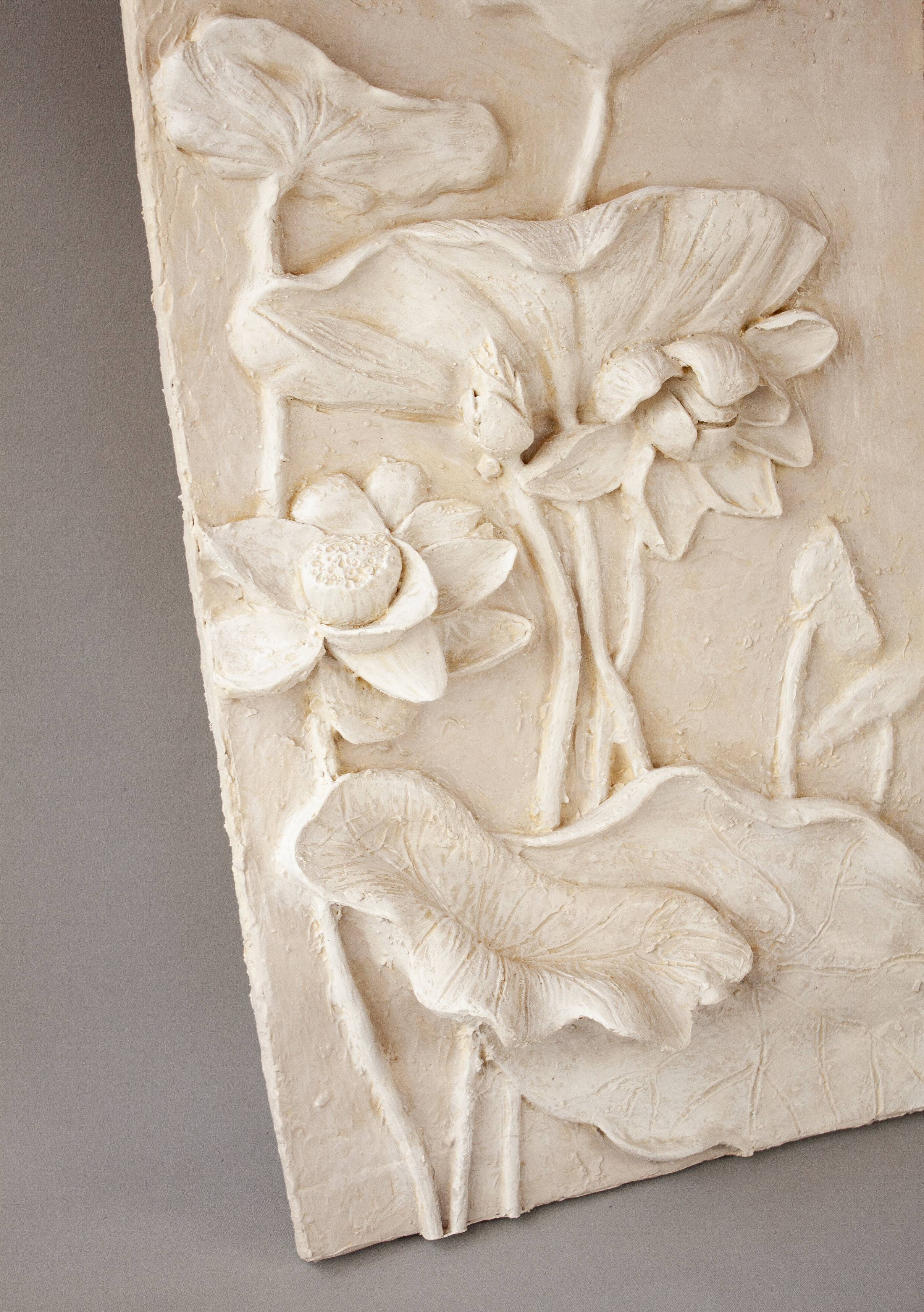 Bas-relief with flowers. Relief with flowers. Flowers in relief.