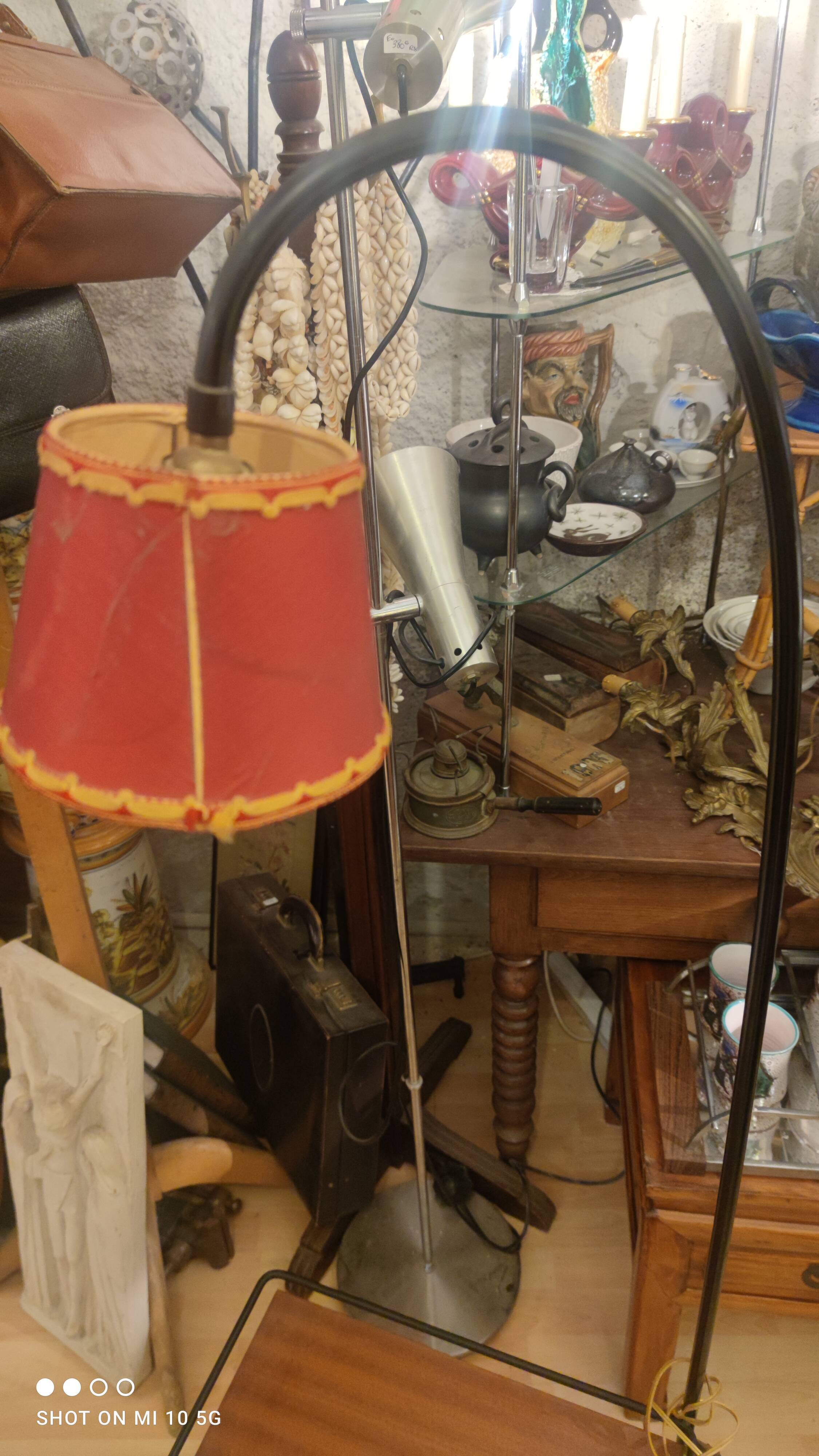 Wrought iron and mahogany floor lamp, circa 1950