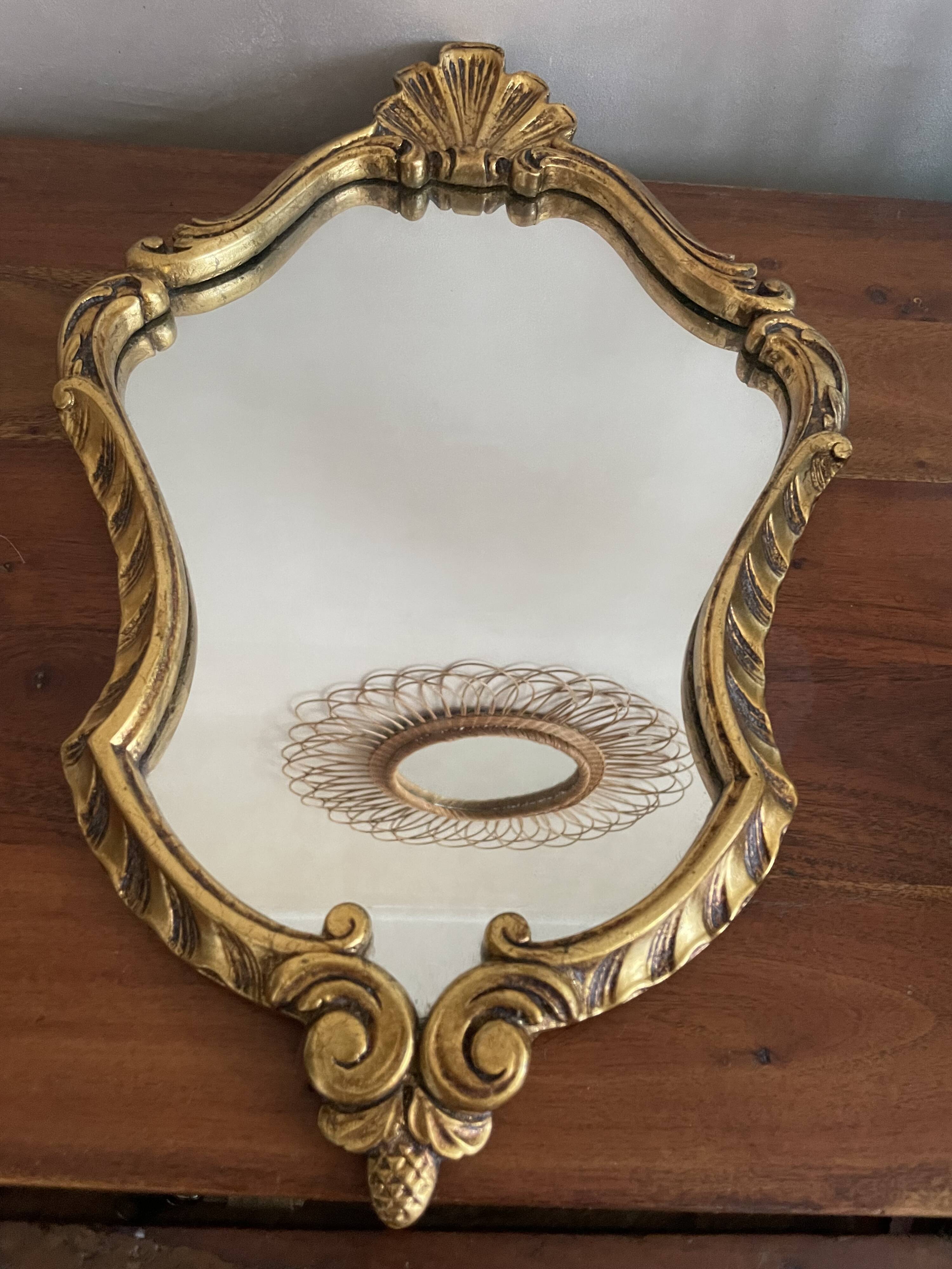 Baroque style mirror in gilded wood