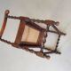Wokkel chair with armrests and webbing seat