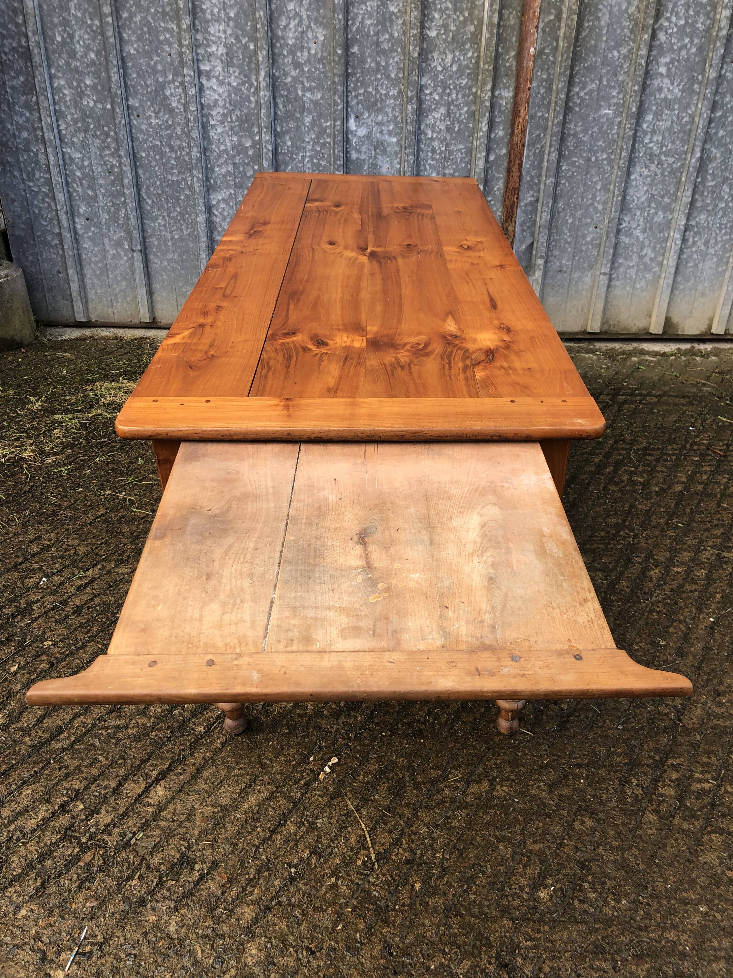 Antique farmhouse table in solid cherry wood in Louis Philippe style.