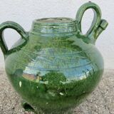 Antique glazed green terracotta oil jar, late 19th century.