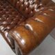 Upholstered chesterfield brown sofa