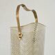Mid-century umbrella stand in patinated brass and perforated metal, 1950s.
