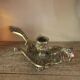 Brass candle holder cave rat peacock