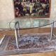 Table ghibli en verre avec 8 chaises parisiennes pieds sabrés roche bobois