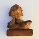 Plaster bust reader