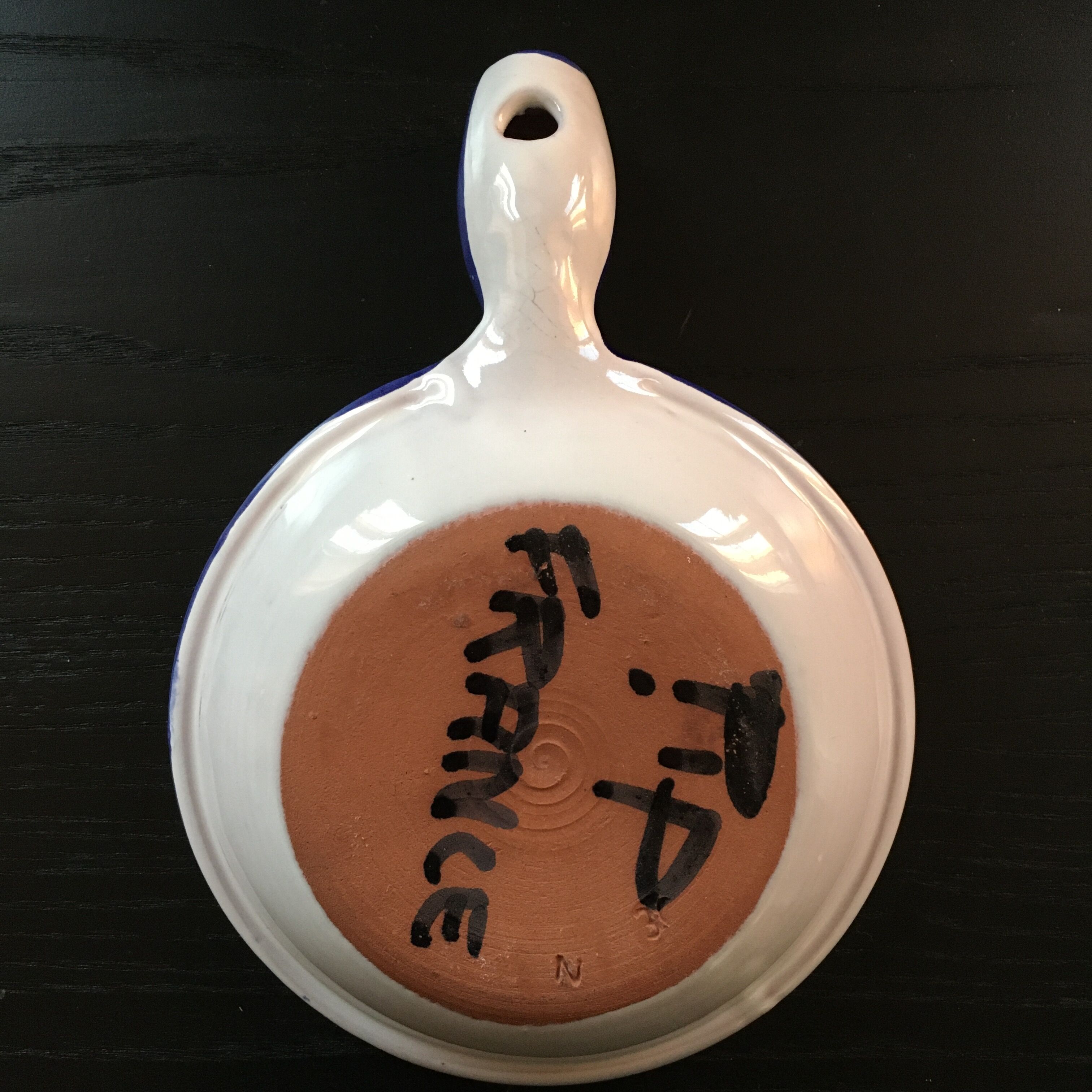 Paire de caquelons décor bleu