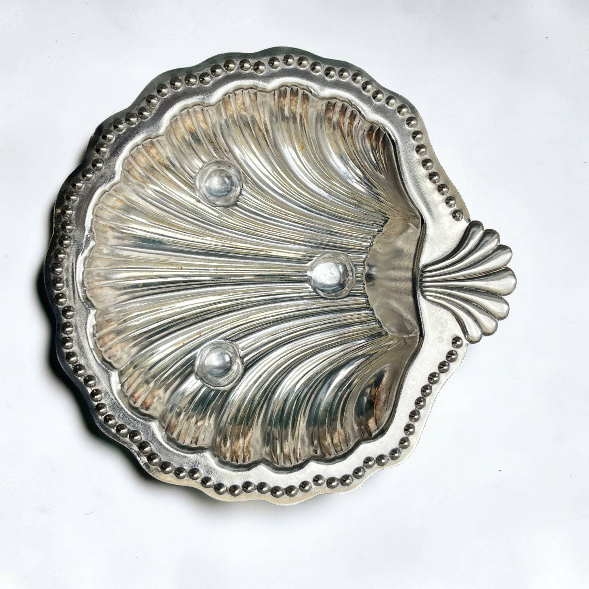 Silver-plated shell butter dish and vintage blue bowl from the 70s.