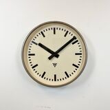 Brown industrial factory wall clock from Pragotron, 1960s