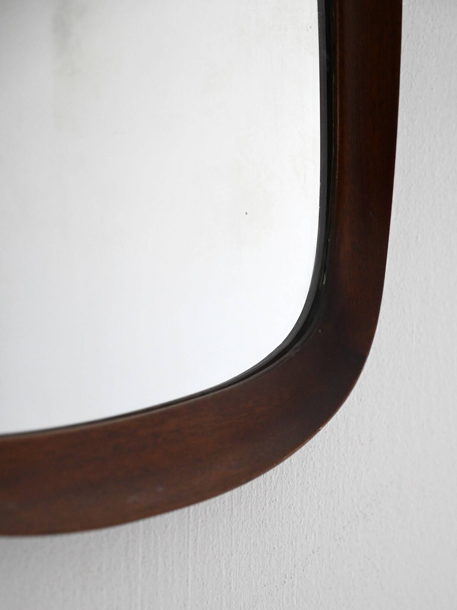 Scandinavian vintage mirror with curved mahogany frame